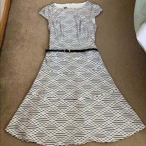 Black and white belted fit and flare dress